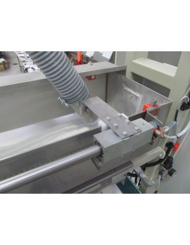 AUTOMATIC GRITS DISTRIBUTOR WITH CUPS...